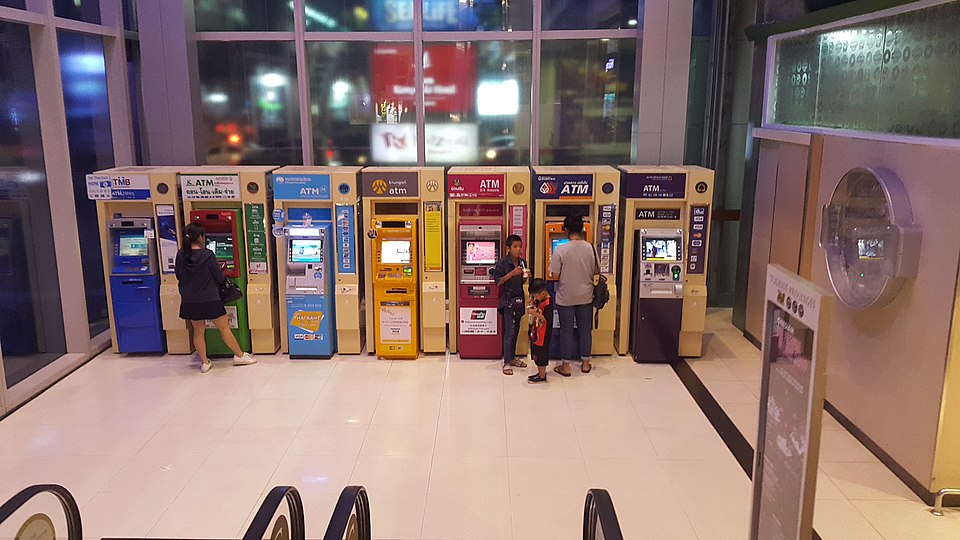 Row of ATMs from Thailand's major banks including KBank, Bangkok Bank, Krungthai and SCB